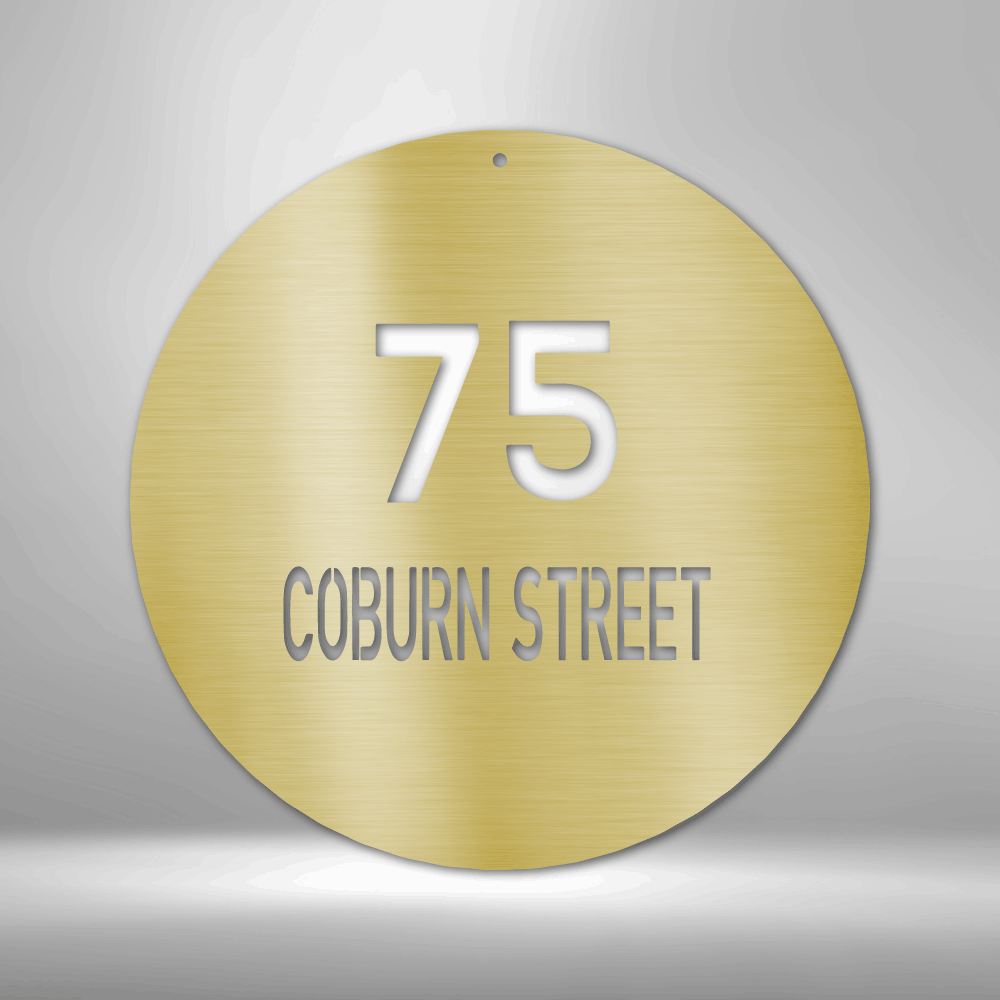 A PERSONALIZED Circle Metal Wall Art Decor with the word main street, perfect for Unique Metal Art Gifts.