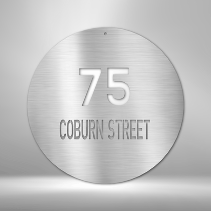 A PERSONALIZED Circle Metal Wall Art Decor with the word main street, perfect for Unique Metal Art Gifts.