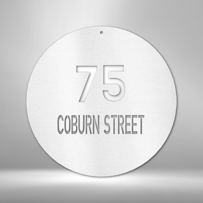 A PERSONALIZED Circle Metal Wall Art Decor with the word main street, perfect for Unique Metal Art Gifts.