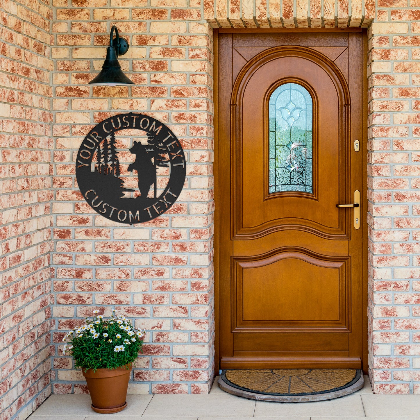 A black BEAR METAL SIGN - Customized Bear Established Steel Monogram Wall Sign on a wood surface, creating Personalized Family Signs.