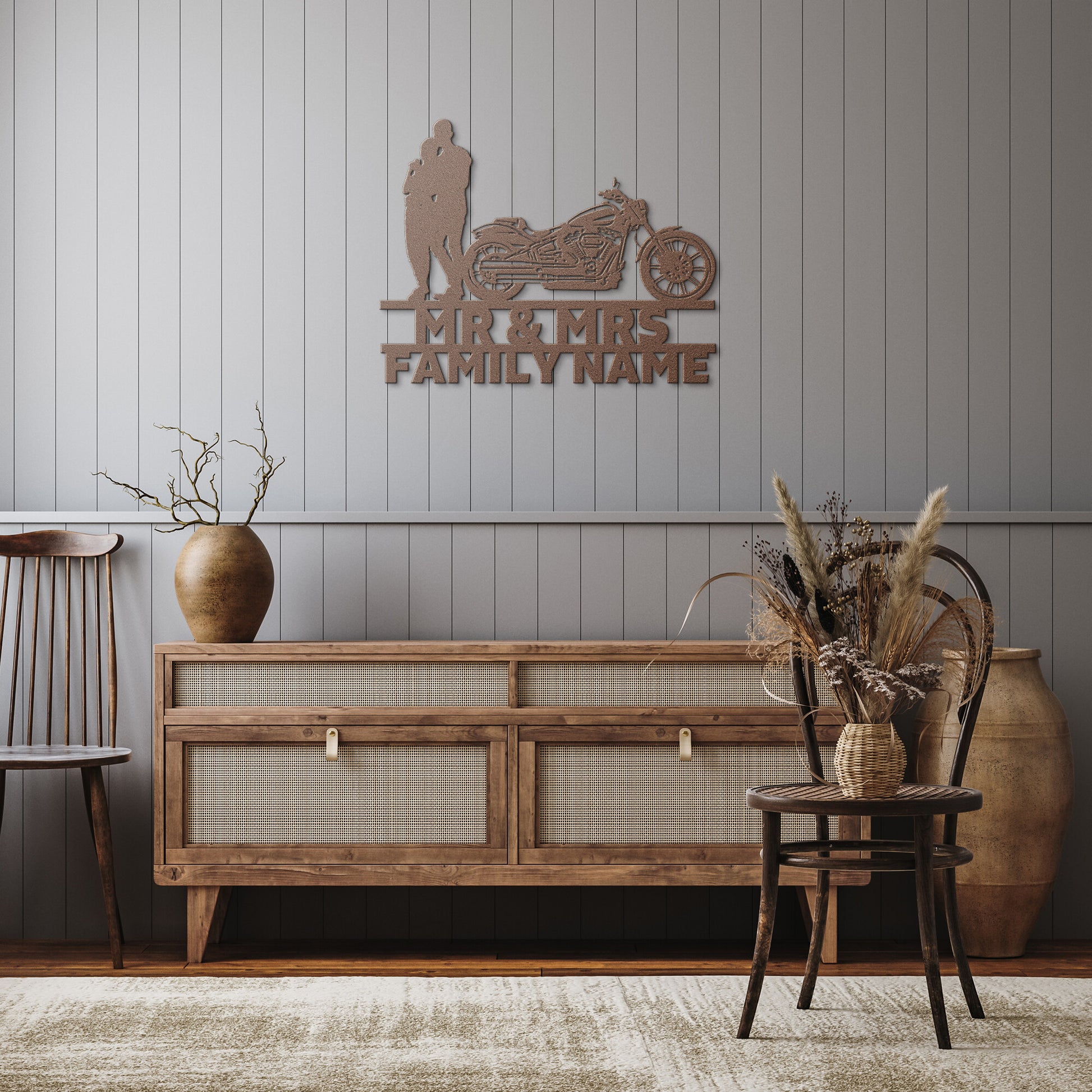 A personalized metal family wall art featuring a silhouette of a Mr&Mrs Harley-Davidson couple SET 13 on a brick wall.