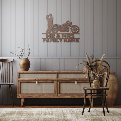 A silhouette of a Mr&Mrs Harley-Davidson couple SET 19, personalized with custom family name signs and crafted from metal for wall art.