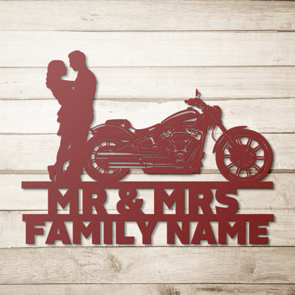 A silhouette of a Mr&Mrs Harley-Davidson couple SET 19, personalized with custom family name signs and crafted from metal for wall art.