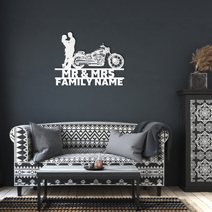 A silhouette of a Mr&Mrs Harley-Davidson couple SET 19, personalized with custom family name signs and crafted from metal for wall art.