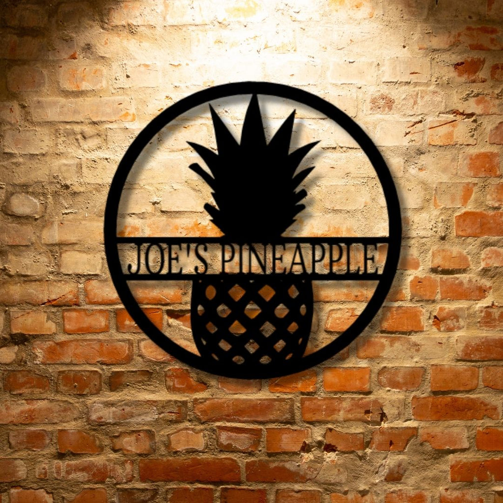 Joe's Pineapple Monogram - Custom Handmade Metal Sign on a durable brick wall.