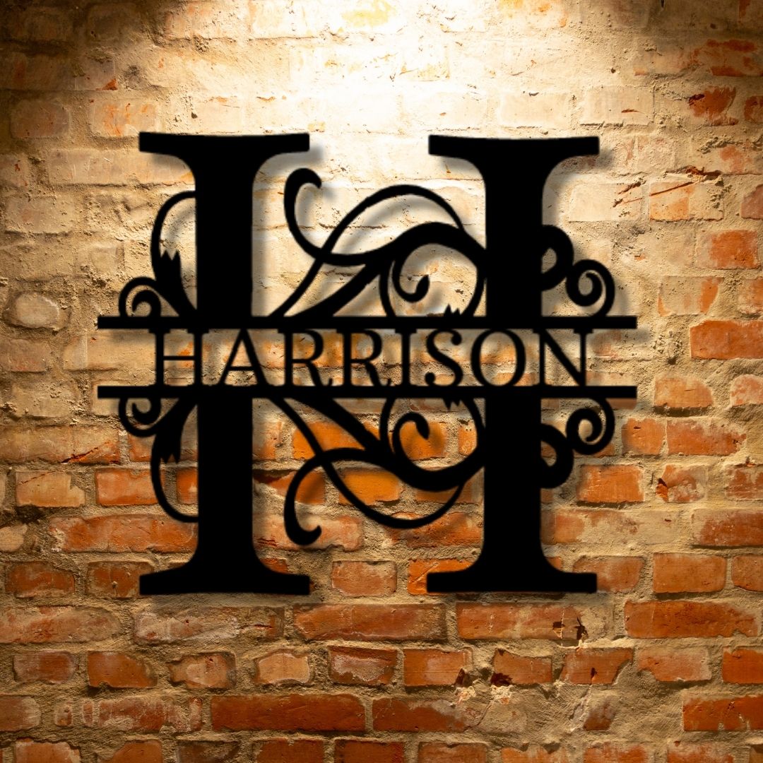 Custom Handmade Metal Wall Art Decor - Split Letter Monogram on a brick wall.