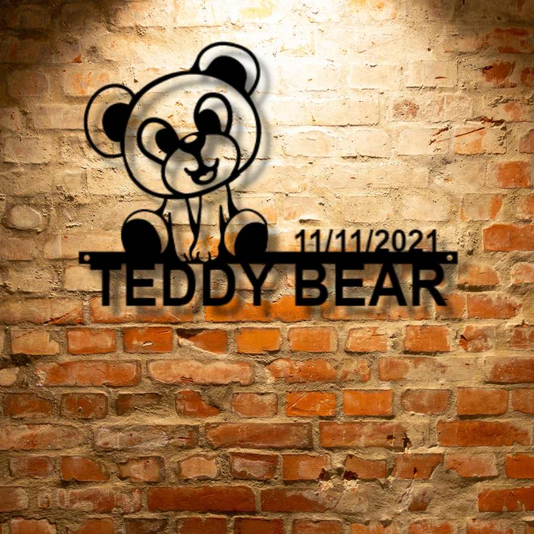 A unique and durable personalized steel sign, featuring a Teddy Monogram, displayed on a brick wall.