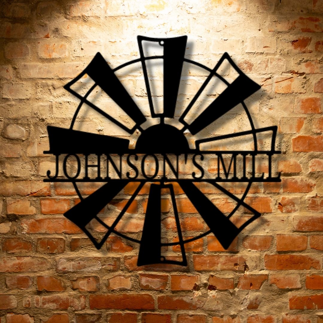 The Windmill Monogram - Durable Outdoor Metal Sign on a brick wall.