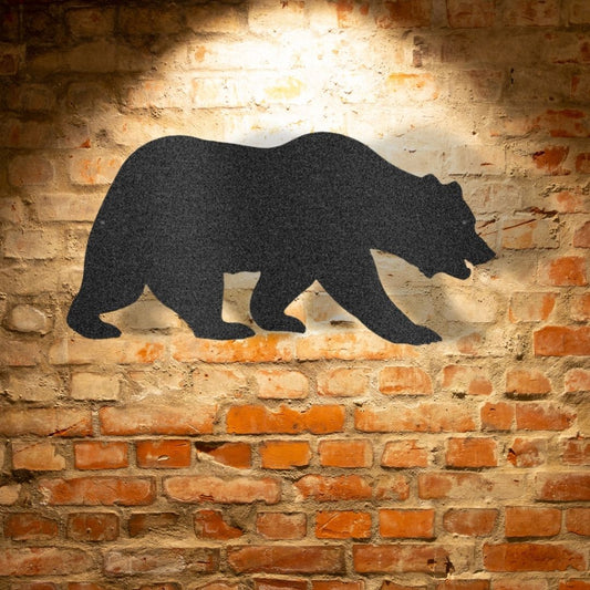 A unique Grizzly Bear steel sign silhouette on a durable brick wall.