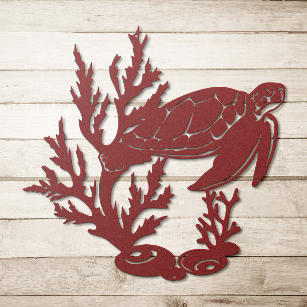 A red Sea Turtle Steel Monogram, a unique metal art gift personalized with custom handmade designs, on a wooden background.