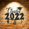 A personalized metal graduation sign featuring a Class of 2022 diploma.