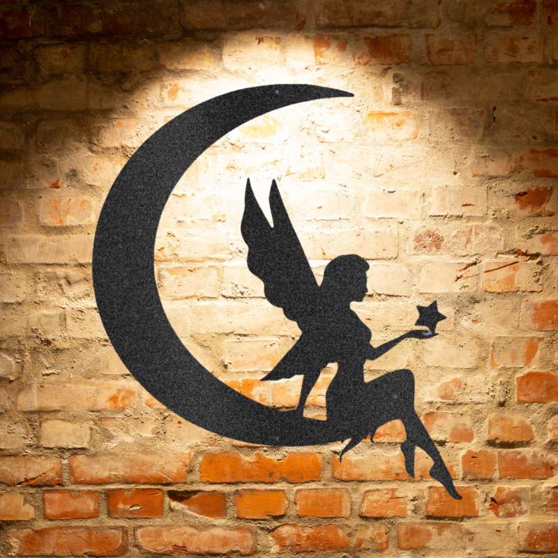 A personalized Fairy Moon - Steel Sign with custom handmade designs, sitting on a crescent on a brick wall.
