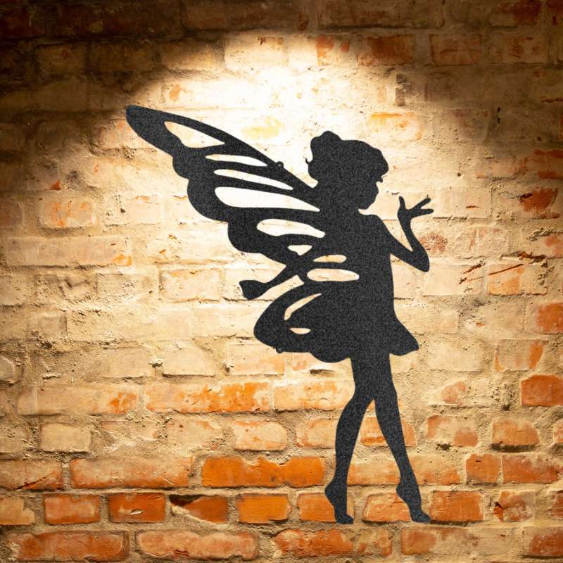 A Unique Metal Art Gift: A Sassy Pixie - Steel Sign silhouetted against a brick wall.